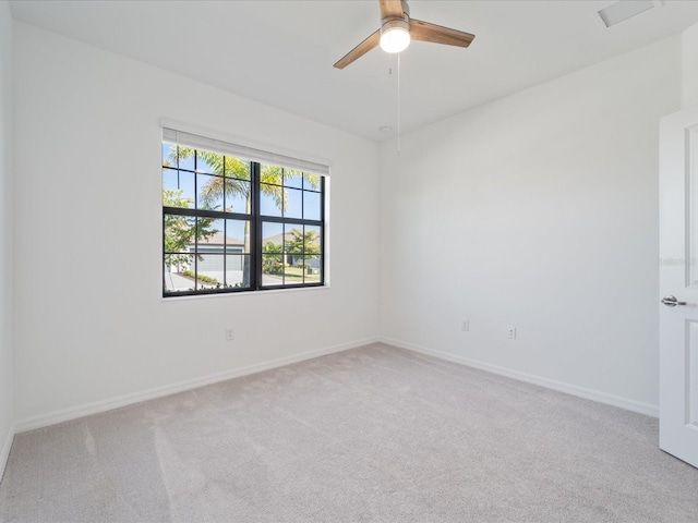 2161 Gardenia Ave, Port Charlotte, FL 33953 - spare room featuring carpet and ceiling fan