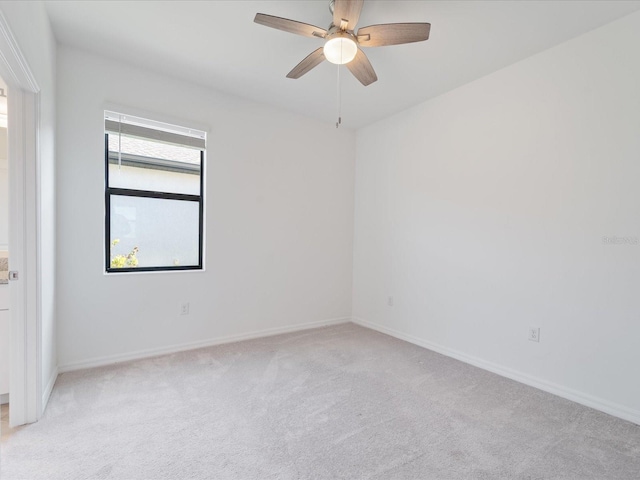 2161 Gardenia Ave, Port Charlotte, FL 33953 - spare room featuring light colored carpet and a ceiling fan