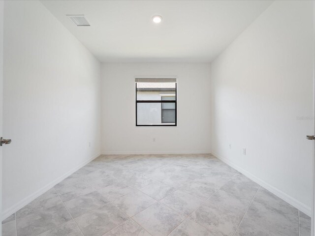 2161 Gardenia Ave, Port Charlotte, FL 33953 - spare room with light tile patterned floors