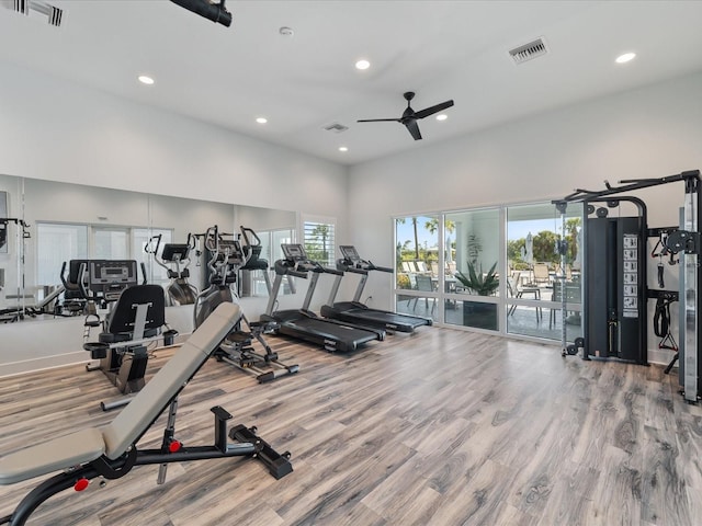 2161 Gardenia Ave, Port Charlotte, FL 33953 - gym featuring ceiling fan, wood finished floors, and recessed lighting