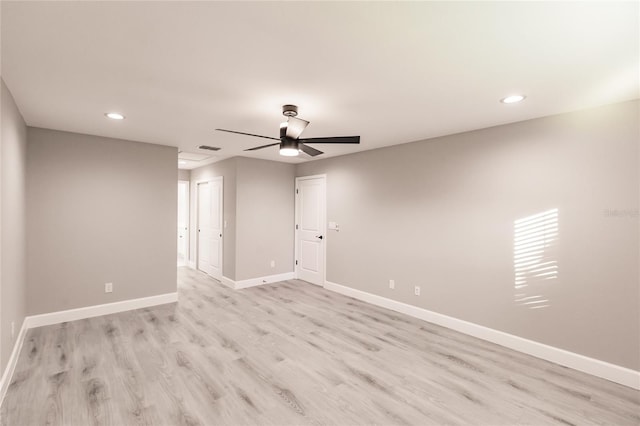 627 SE 22nd Ter, Cape Coral, FL 33990 - spare room featuring ceiling fan, recessed lighting, and light wood-style flooring