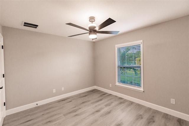 627 SE 22nd Ter, Cape Coral, FL 33990 - spare room with ceiling fan and light wood-style flooring