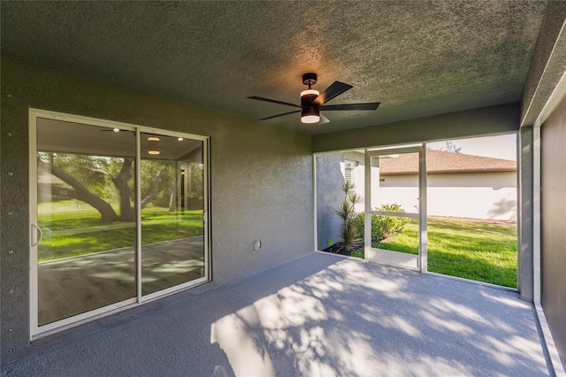 627 SE 22nd Ter, Cape Coral, FL 33990 - unfurnished sunroom featuring a ceiling fan