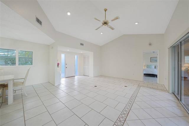 1915 Pebble Beach Ct, Venice, FL 34293 - unfurnished living room with a ceiling fan, light tile patterned flooring, recessed lighting, and high vaulted ceiling