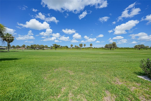 1915 Pebble Beach Ct, Venice, FL 34293 - view of grassy yard with view of golf course