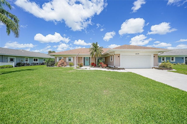 1915 Pebble Beach Ct, Venice, FL 34293 - ranch-style house featuring an attached garage, stucco siding, driveway, and a front lawn
