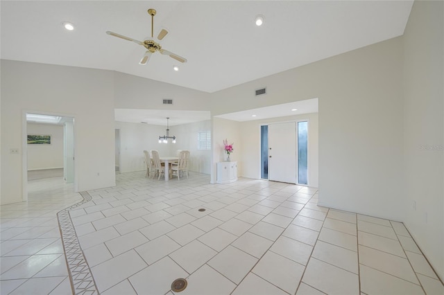 1915 Pebble Beach Ct, Venice, FL 34293 - spare room featuring vaulted ceiling, ceiling fan, light tile patterned floors, and recessed lighting