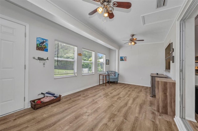 1478 Harmony Dr, Port Charlotte, FL 33952 - unfurnished living room featuring ceiling fan and light wood finished floors