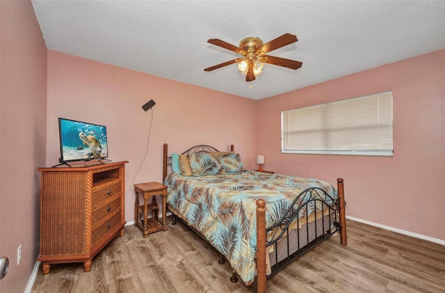 1478 Harmony Dr, Port Charlotte, FL 33952 - bedroom with wood finished floors and a ceiling fan