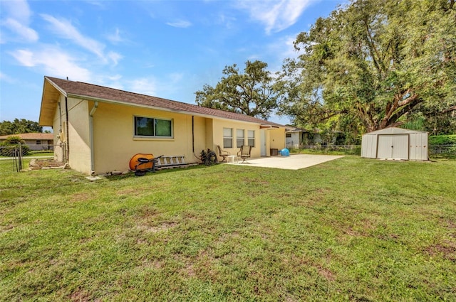 1478 Harmony Dr, Port Charlotte, FL 33952 - back of property with a patio, stucco siding, and a shed