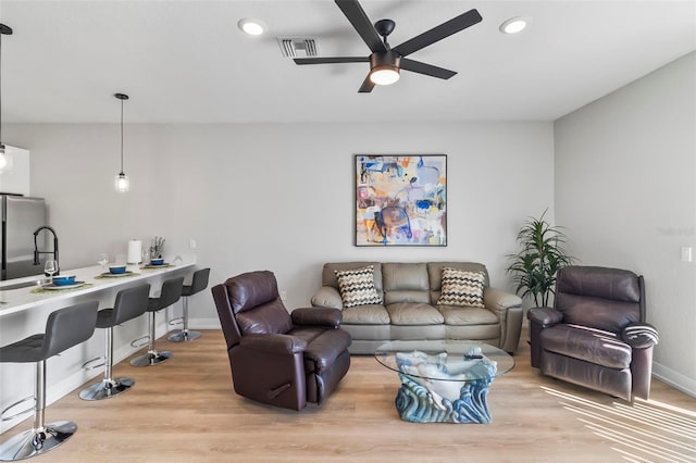 9155 Agate St, Port Charlotte, FL 33981 - living area featuring ceiling fan, light wood finished floors, and recessed lighting