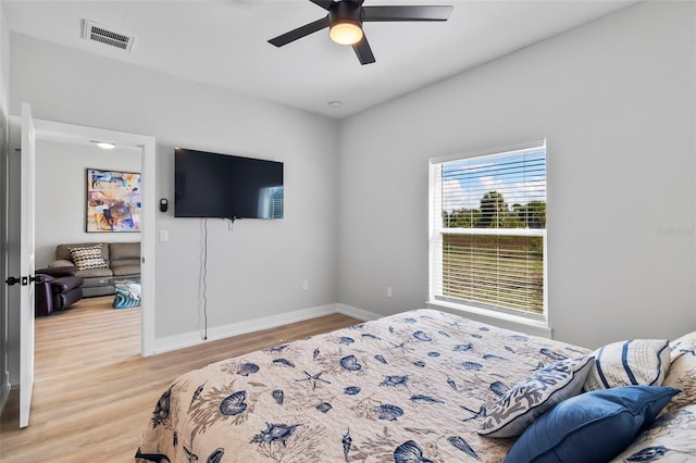 9155 Agate St, Port Charlotte, FL 33981 - bedroom with light wood-type flooring and ceiling fan