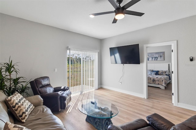 9155 Agate St, Port Charlotte, FL 33981 - living room featuring light wood-type flooring and a ceiling fan