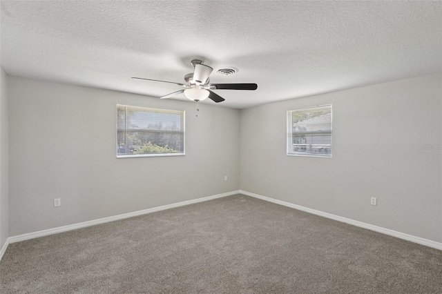 1107 Seneca Rd, Venice, FL 34293 - unfurnished room with a ceiling fan, carpet, and a textured ceiling
