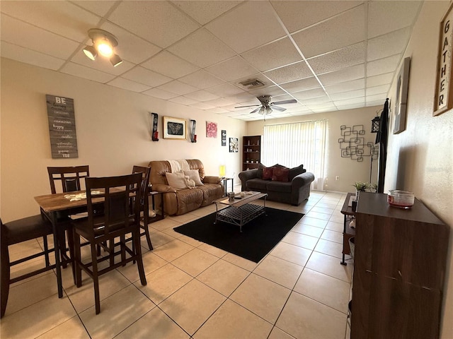 3116 Harbor Blvd Unit 3B, Port Charlotte, FL 33952 - living area with a drop ceiling, a ceiling fan, and light tile patterned flooring