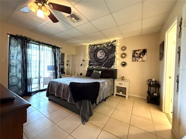 3116 Harbor Blvd Unit 3B, Port Charlotte, FL 33952 - bedroom featuring a drop ceiling, light tile patterned floors, access to outside, and ceiling fan