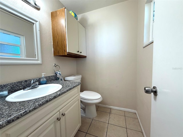 3116 Harbor Blvd Unit 3B, Port Charlotte, FL 33952 - half bathroom with vanity and tile patterned flooring
