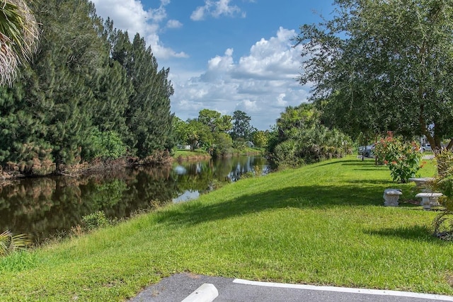 3116 Harbor Blvd Unit 3B, Port Charlotte, FL 33952 - view of green lawn with a water view