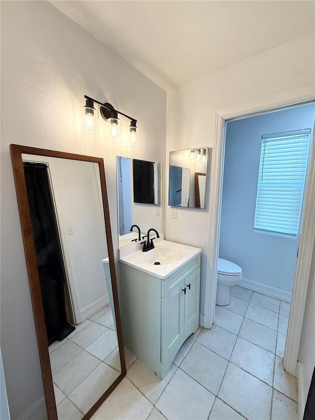 24 Charwood Cir, Lehigh Acres, FL 33936 - bathroom with vanity and tile patterned flooring