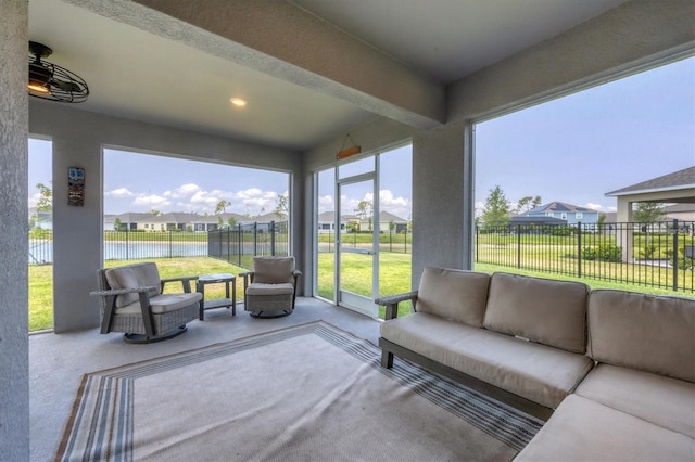 16833 Terrapin Key Dr, Port Charlotte, FL 33953 - sunroom featuring an outdoor hangout area, carpet flooring, a residential view, and recessed lighting
