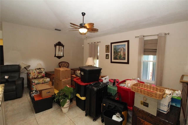 39 Norman St, Port Charlotte, FL 33954 - living room with ceiling fan and light tile patterned floors