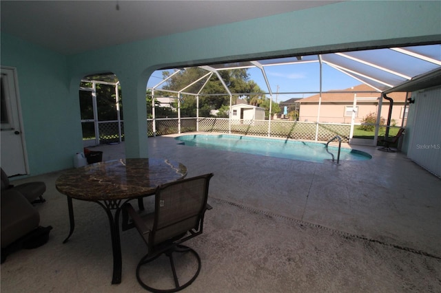 39 Norman St, Port Charlotte, FL 33954 - view of swimming pool with a shed, a patio area, and glass enclosure