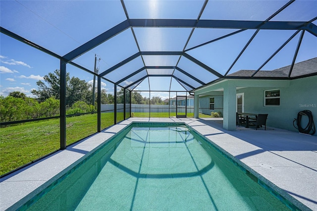 12112 Helios Ave, Port Charlotte, FL 33981 - swimming pool with a yard, a patio area, and glass enclosure