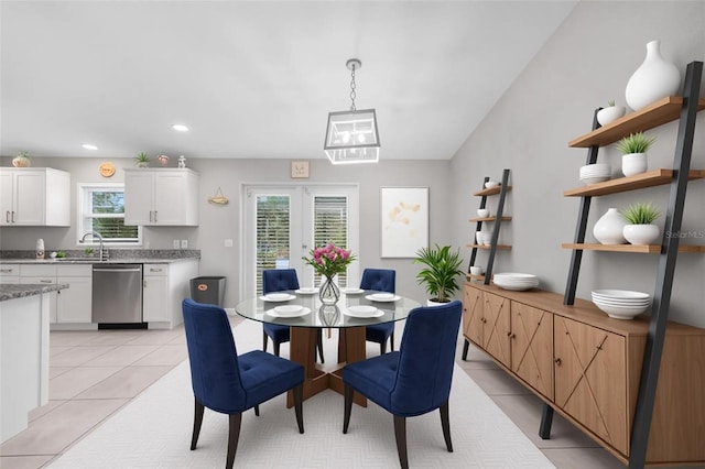 12112 Helios Ave, Port Charlotte, FL 33981 - dining room with light tile patterned flooring, recessed lighting, and french doors
