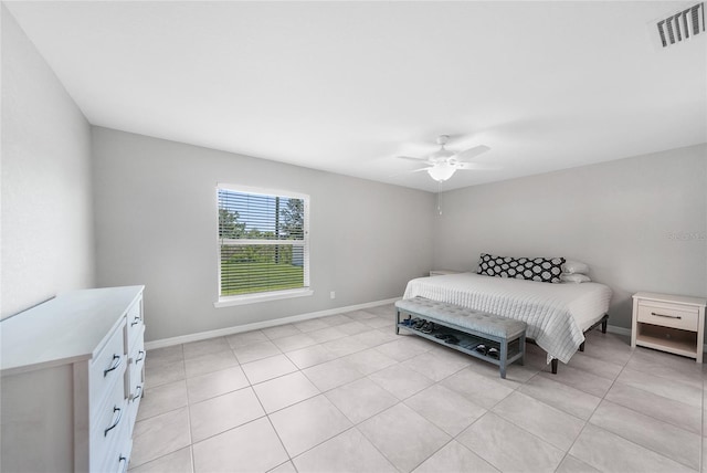 12112 Helios Ave, Port Charlotte, FL 33981 - bedroom featuring light tile patterned floors and ceiling fan