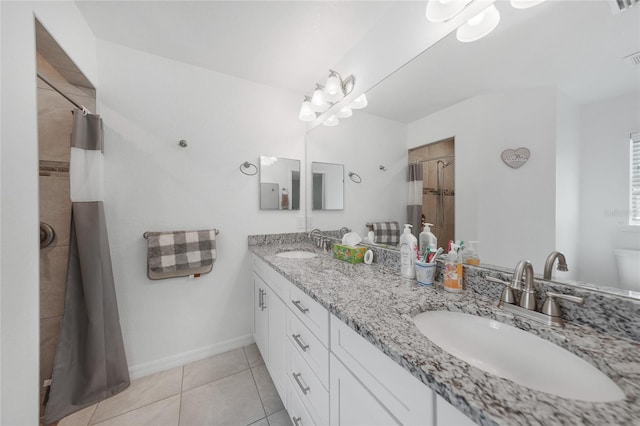 12112 Helios Ave, Port Charlotte, FL 33981 - full bathroom featuring a tile shower, double vanity, and tile patterned floors