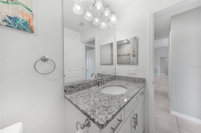12112 Helios Ave, Port Charlotte, FL 33981 - bathroom featuring vanity and tile patterned flooring