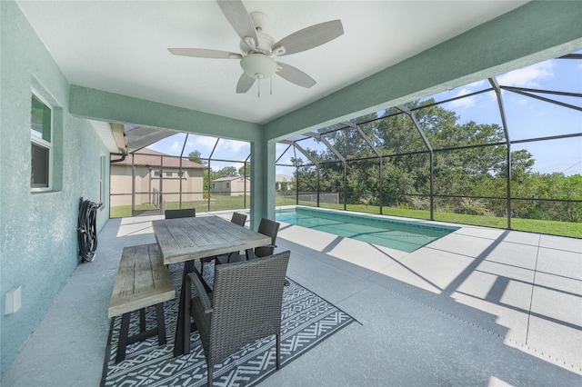 12112 Helios Ave, Port Charlotte, FL 33981 - outdoor pool featuring a patio, ceiling fan, a lanai, and outdoor dining area