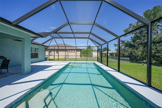 12112 Helios Ave, Port Charlotte, FL 33981 - swimming pool featuring a lawn, a patio area, and a lanai