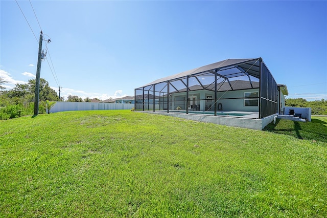 12112 Helios Ave, Port Charlotte, FL 33981 - view of yard featuring glass enclosure and an outdoor pool