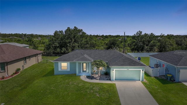 12112 Helios Ave, Port Charlotte, FL 33981 - single story home featuring a garage, driveway, roof with shingles, and stucco siding