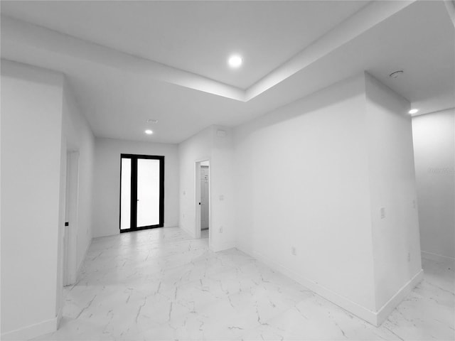 3113 58th, Lehigh Acres, FL 33971 - empty room featuring light marble finish floors and recessed lighting
