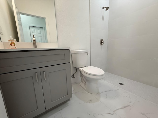 3113 58th, Lehigh Acres, FL 33971 - bathroom featuring marble look tiles, tiled shower, and vanity