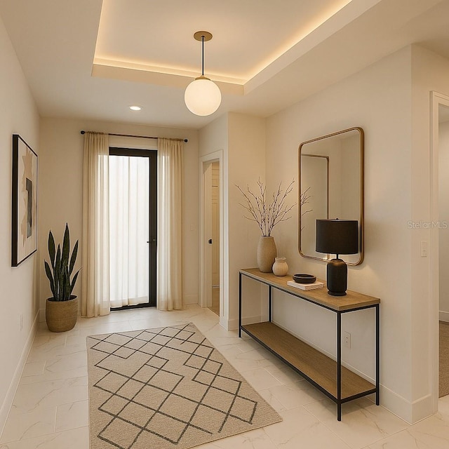 3113 58th, Lehigh Acres, FL 33971 - entrance foyer with light marble finish flooring, a raised ceiling, and recessed lighting
