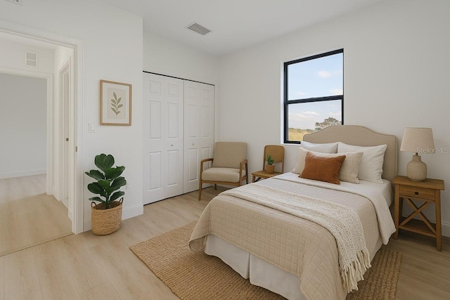 3113 58th, Lehigh Acres, FL 33971 - bedroom featuring light wood-style floors and a closet