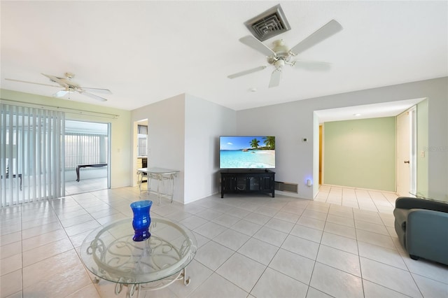 475 Whippoorwill Dr, Venice, FL 34293 - living room with ceiling fan and light tile patterned floors