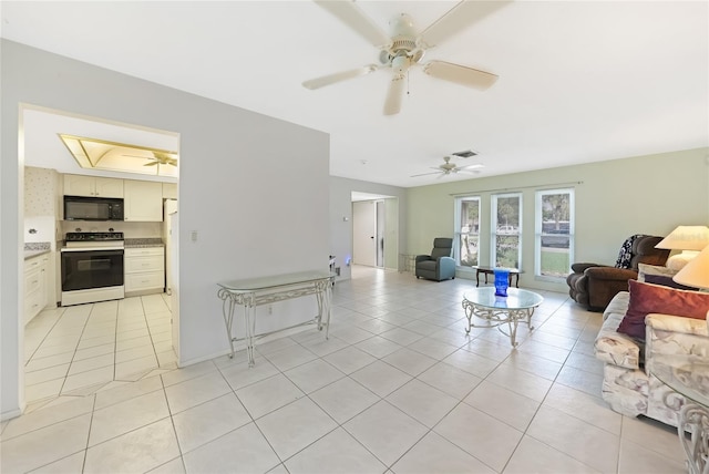 475 Whippoorwill Dr, Venice, FL 34293 - living room with light tile patterned floors and ceiling fan