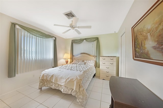 475 Whippoorwill Dr, Venice, FL 34293 - bedroom with light tile patterned floors and a ceiling fan