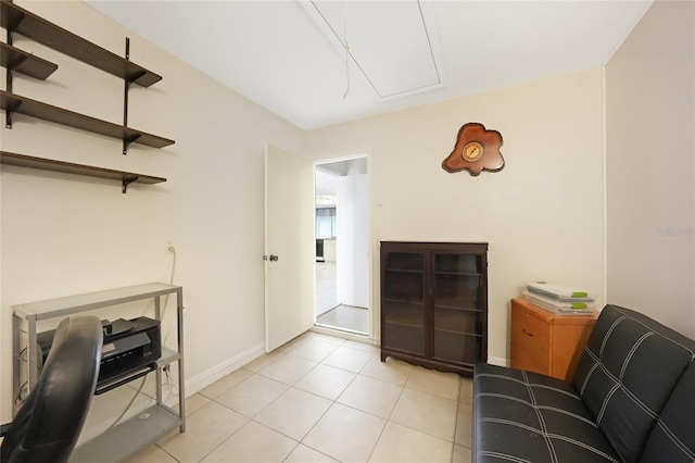 475 Whippoorwill Dr, Venice, FL 34293 - living area featuring attic access and light tile patterned floors