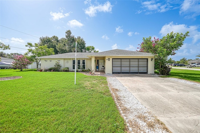 475 Whippoorwill Dr, Venice, FL 34293 - ranch-style home featuring an attached garage, concrete driveway, a front lawn, and stucco siding