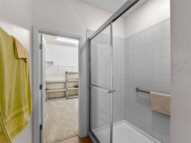 8814 Tuscany Isles Dr, Punta Gorda, FL 33950 - bathroom with a stall shower and a spacious closet