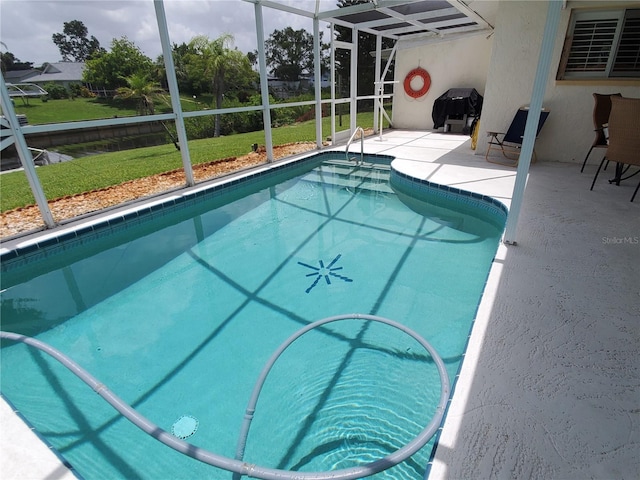 2220 Broad Ranch Dr, Port Charlotte, FL 33948 - swimming pool with a patio, glass enclosure, grilling area, and a yard