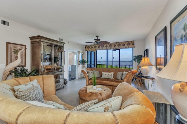 900 E Marion Ave Unit 1403, Punta Gorda, FL 33950 - living area with ceiling fan and tile patterned flooring