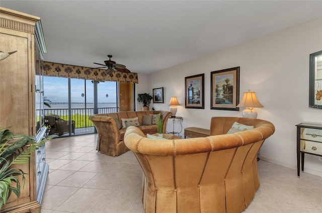 900 E Marion Ave Unit 1403, Punta Gorda, FL 33950 - living room featuring light tile patterned flooring and a ceiling fan