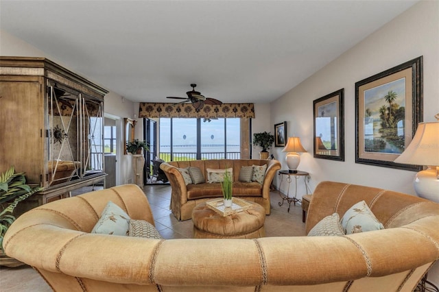 900 E Marion Ave Unit 1403, Punta Gorda, FL 33950 - tiled living area with ceiling fan and healthy amount of natural light