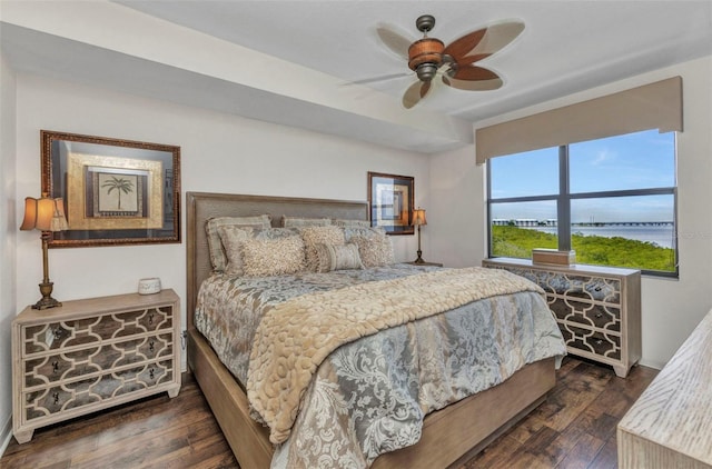 900 E Marion Ave Unit 1403, Punta Gorda, FL 33950 - bedroom featuring wood finished floors, a water view, and a ceiling fan